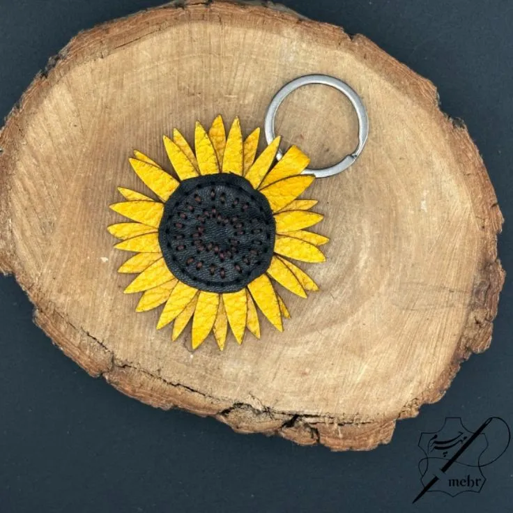 جاکلیدی چرم طبیعی طرح گل آفتاب گردان