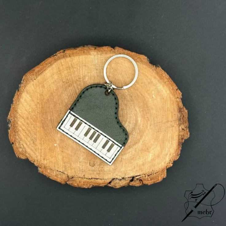 جاکلیدی چرم طبیعی طرح پیانو