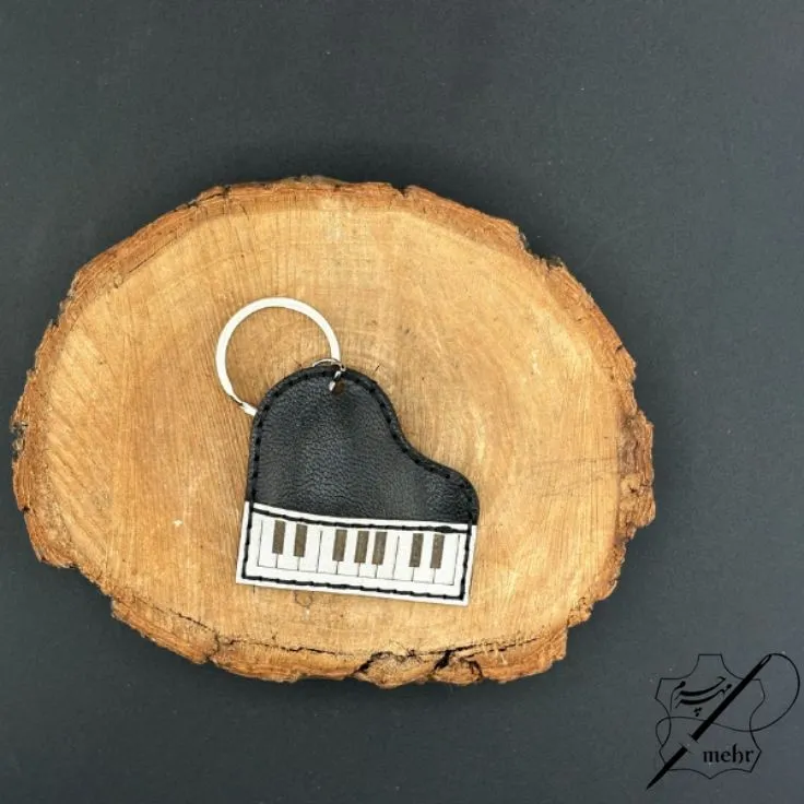 جاکلیدی چرم طبیعی طرح پیانو